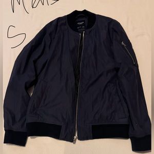 Blue zip up jacket